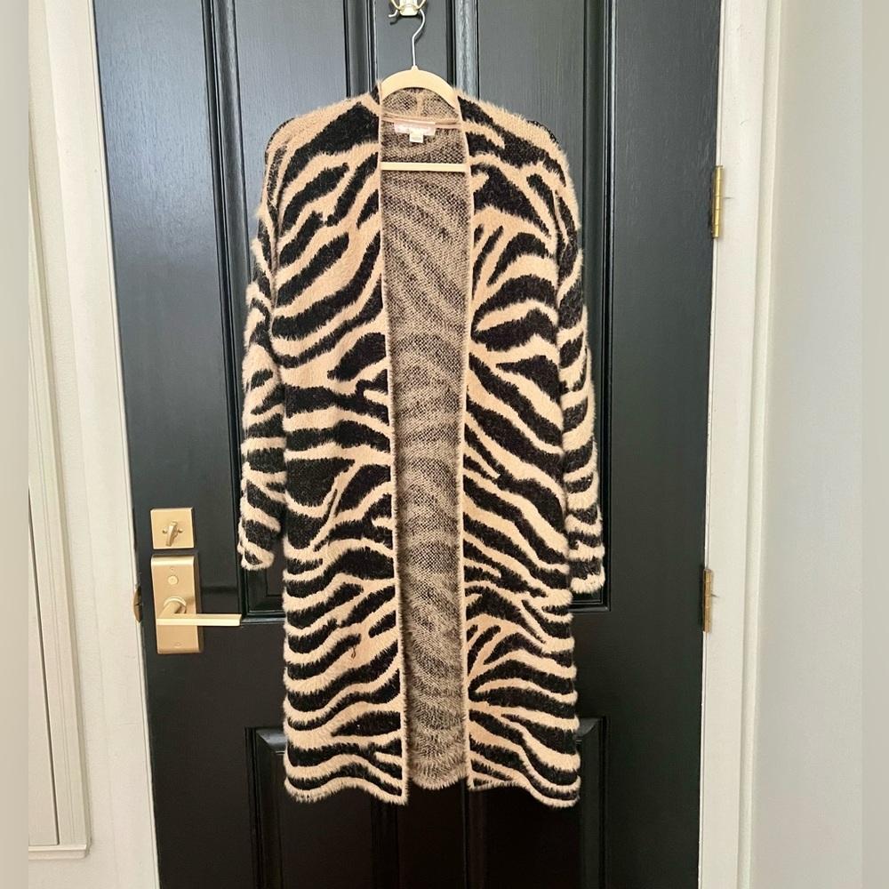 Cardigan animal print sweater.  size small but runs big